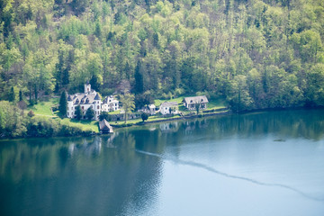 Fototapeta premium Autumn landscape with lake and old mansion