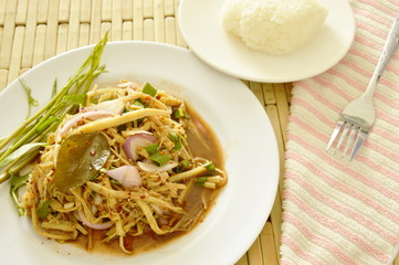 spicy slice bamboo shoot salad in Thai northeastern style eat with sticky rice