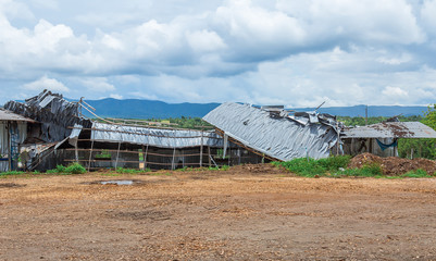 Destroyed metallic roof after hurricane view detail