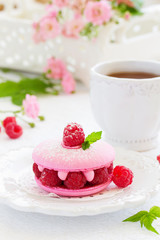 French makarons cake with raspberries.