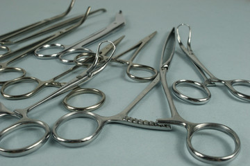 Medical surgical Instruments on blue background.