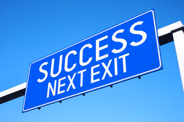 Success - next exit - street sign