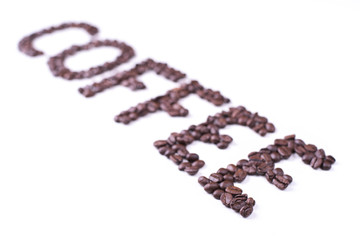 Coffee inscription composed of roasted coffee beans on white background, design for your coffee shop