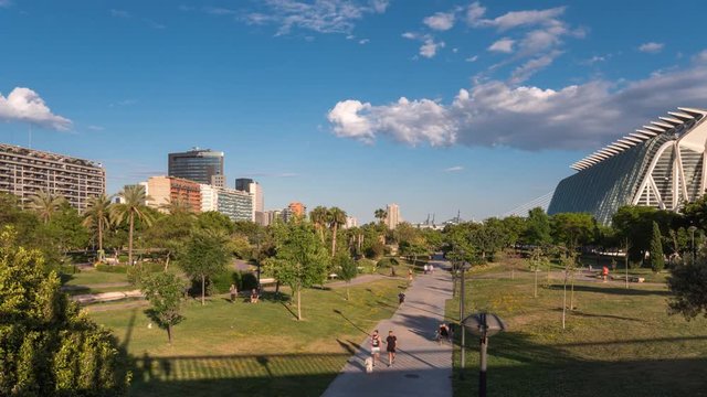 Turia River gardens Jardin del Turia time lapse, leisure and sport area. Pedestrian walk way. Valencia, Spain