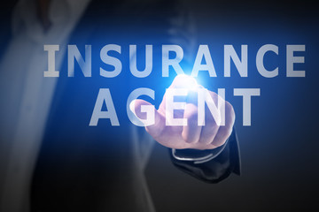 Male hand with finger pointing on dark background