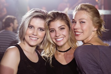 Portrait of smiling young female friends