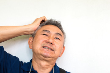 Picture of elderly asian man has a headache