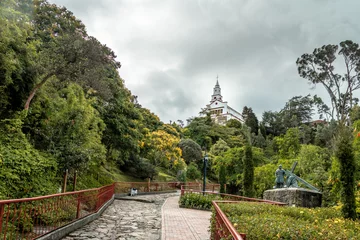 Gordijnen Walkway on top of Monserrate Hill with Monserrate Church on background - Bogota, Colombia © diegograndi