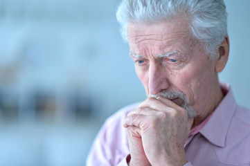 Sad elderly man closeup
