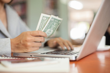 laptop,money,Online shopping concept