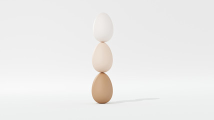 Three eggs and one above the other on white background