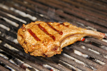 Delicious chuck steaks on the grill.