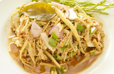 spicy shredded bamboo shoot salad in Thai northeastern style on plate