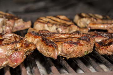 Delicious chuck steaks on the grill.