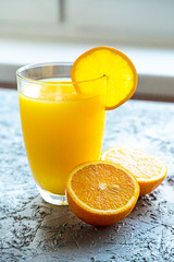Fresh Orange Juice in Glass Summer Concept 