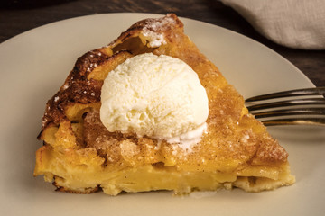 Closeup photo of slice of apple pie with icecream cone