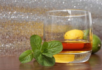whiskey in a glass with lemon