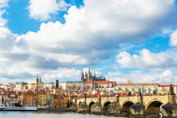 Aerial view of Charles Bridge (Karluv Most) over the Vltava river. This is a famous historic and touristic bridge in Prague.