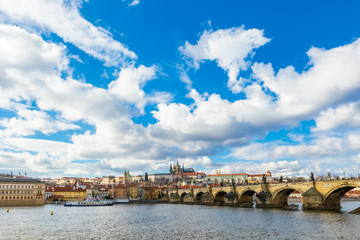 Obraz premium Aerial view of Charles Bridge (Karluv Most) over the Vltava river. This is a famous historic and touristic bridge in Prague.