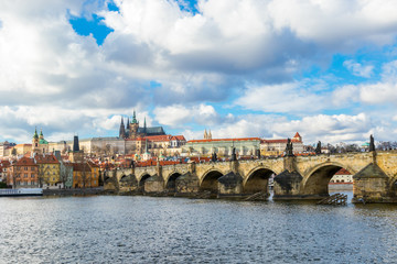 Obraz premium Aerial view of Charles Bridge (Karluv Most) over the Vltava river. This is a famous historic and touristic bridge in Prague.