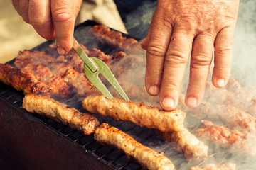 BBQ. Closeup of barbecue grilling picnic in backyard outdoor