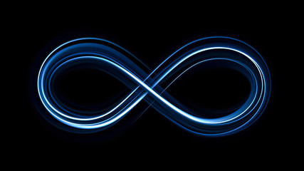 Lighting 3d infinity symbol. Beautiful glowing signs..Sparkling rings. Swirl icon on black background..Luminous trail effect. Colorful isolated sparkling loop.