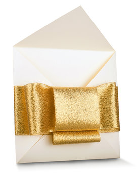 postcard white designer cardboard tabby with gold satin bow wedding invitation on a dark cloth grey background