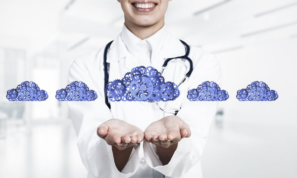 medicine worker presenting in her palms cloud computing concept 