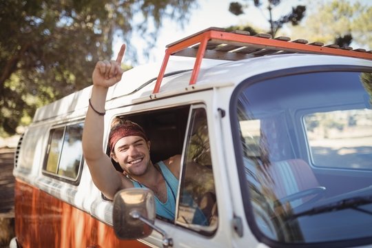 Portrait Of Happy Man Driving Van