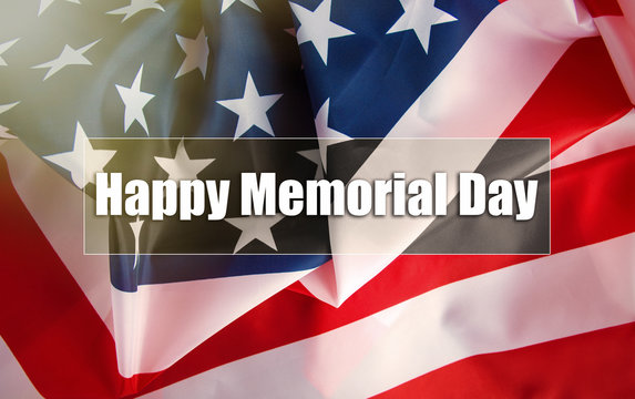 Text Memorial Day on American flag  background. toned image card 