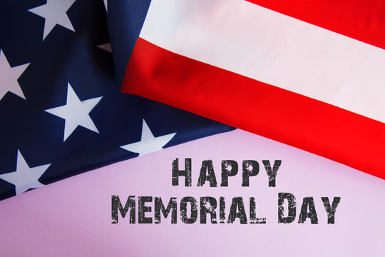 Text Memorial Day on American flag  background. toned image card 