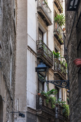Narrow street in gothic quarter of Barcelona