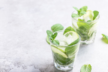 Mojito cocktail on light gray background