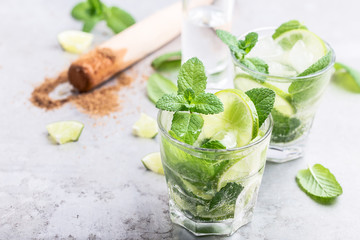 Mojito cocktail on light gray background