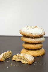 Homemade healthy nuts cookies on grey and white background. Isolated. Selective focus. Vertical