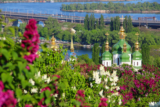 Vydubychi Monastery with lilac blossom in Kyiv, Ukraine