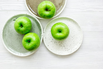 fresh organic green fruits with apples on white background top view