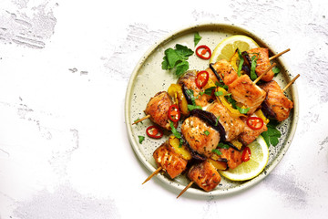 Grilled salmon kebab.Top view with copy space.