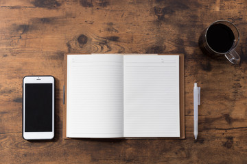 notebook on wooden table