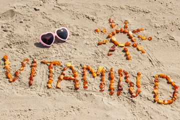 Sunglasses, inscription vitamin D and shape of sun at beach, concept of summer time and healthy...