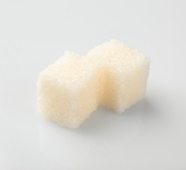 Sugar cubes on white background