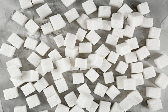 Sugar cubes as background © Africa Studio