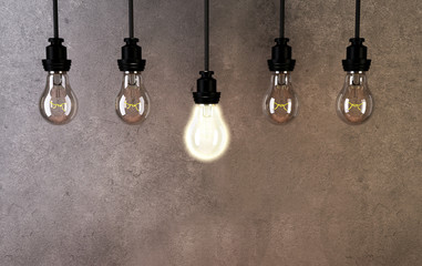 Fototapeta na wymiar light bulbs on a gray background