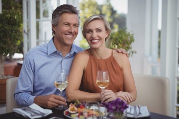 Couple having wine in restaurant