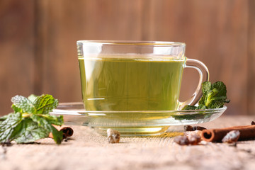 Cup of tea on wooden background