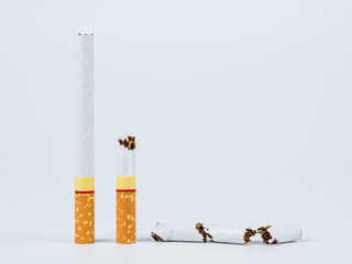 Broken cigarette on white background. World No Tobacco Day concept.