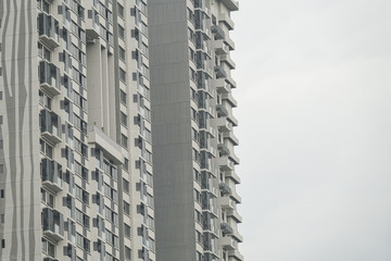 high rise condominium buildings construction site.