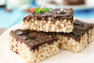 Delicious crispy dessert with chocolate on plate