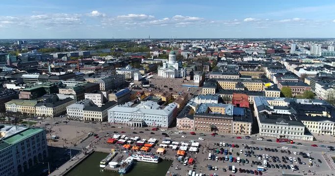 Helsinki harbor, Cinema 4k aerial view of kauppatori market square and the orthodox church, on a sunny summer day, in Helsinki, Finland