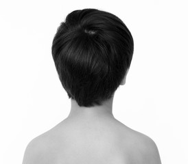 Naklejka premium Little boy bare schest rear view studio portrait